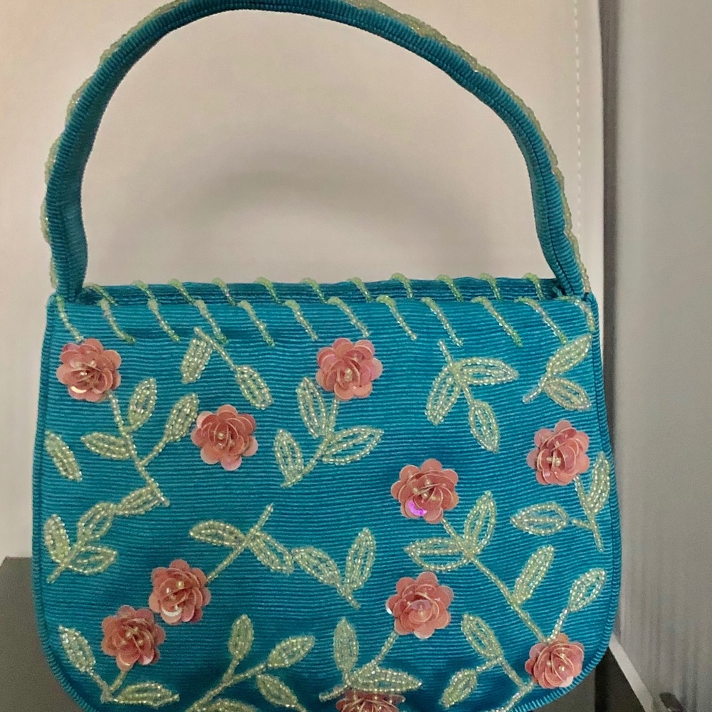 Franchi turquoise  all over beaded with pink flowers